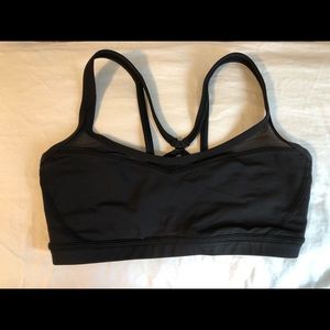 Black Lululemon sports bra with mesh detailing.